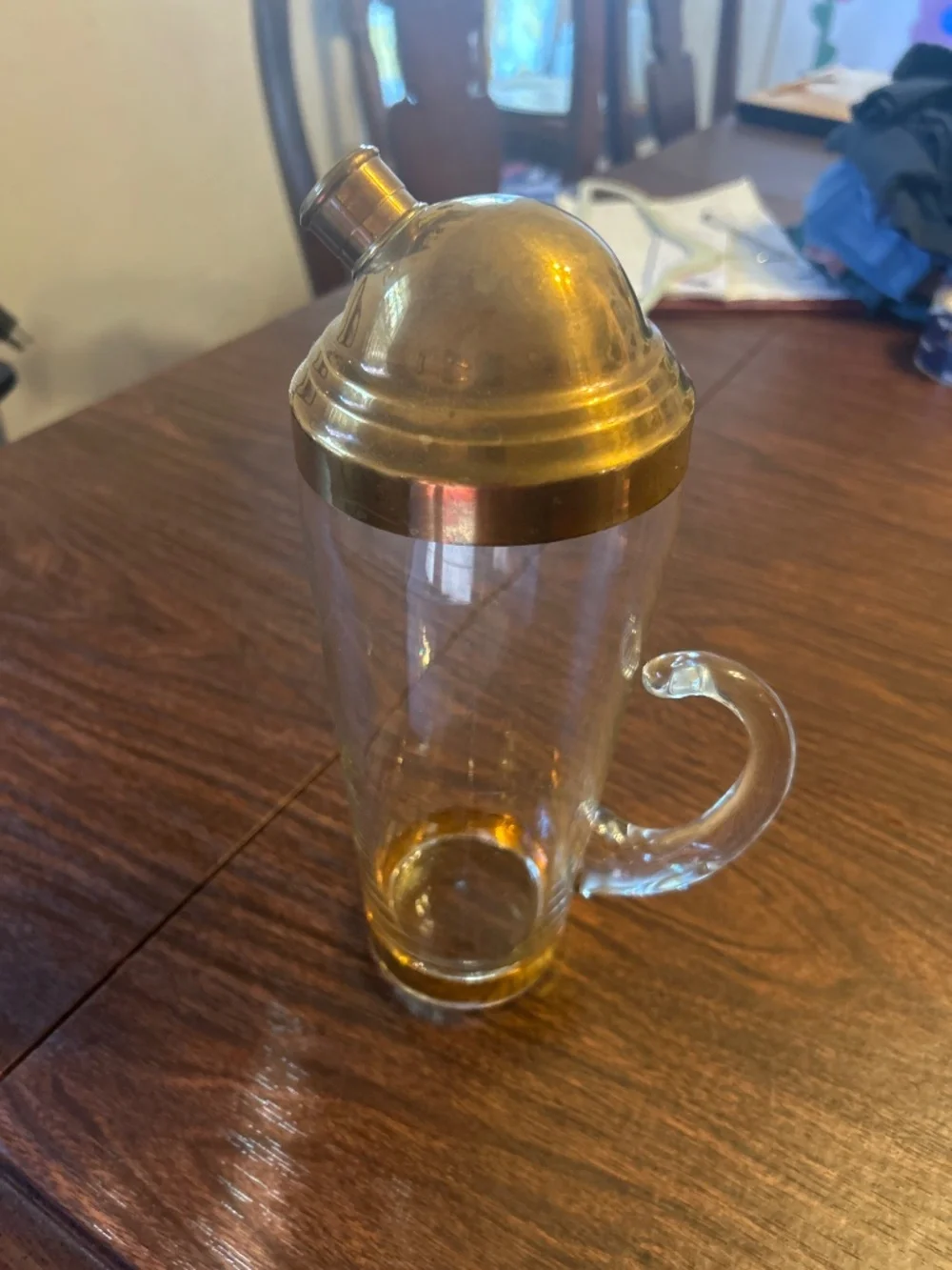 Atomic Glass Shaker bottle with brass lid.